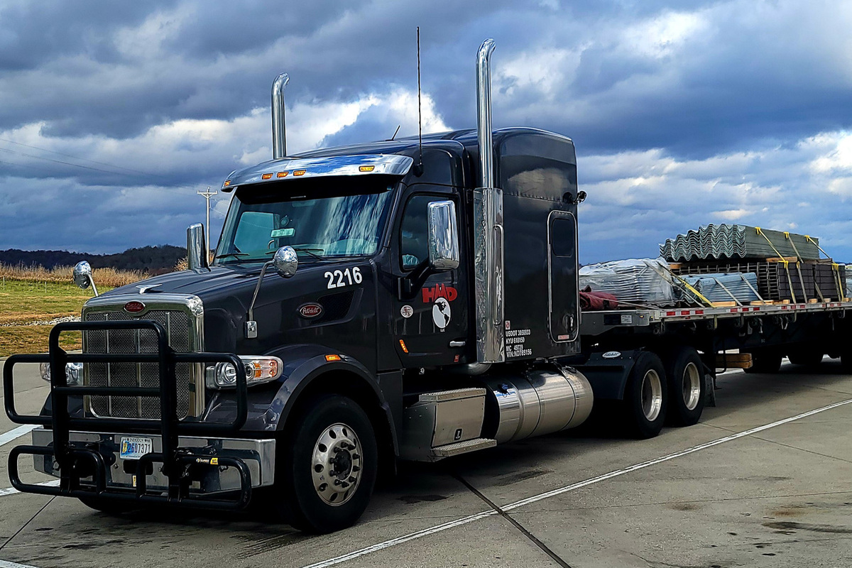  Pros And Cons Of Flatbed Trucking How To Secure And Tarp Loads 